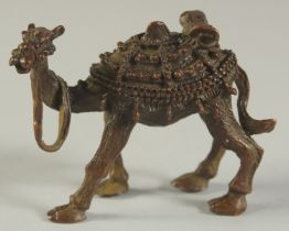 A BRONZE OKIMONO OF A CAMEL, 7cm long.