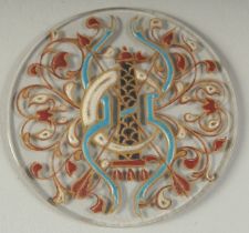 A FINE ISLAMIC OR EUROPEAN MAMLUK STYLE ENAMELLED GLASS ROUNDEL, depicting a central crescent with