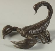 A LARGE BRONZE OKIMONO OF A SCORPION, with articulated legs, 12cm long.