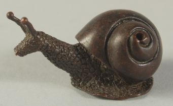 A BRONZE OKIMONO OF SNAIL, 5cm long.