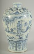 A CHINESE BLUE AND WHITE PORCELAIN MEIPING VASE, painted with figures, 25cm high.
