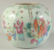 A CHINESE FAMILLE ROSE PORCELAIN JAR AND HARDWOOD COVER, painted with figures, 22cm high overall.