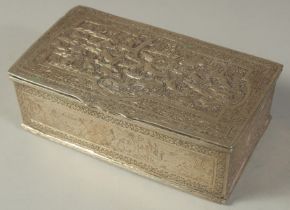AN EMBOSSED AND CHASED SILVER BOX, with hinged lid, finely decorated with various animals, 13cm x