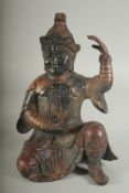 A CHINESE BRONZE KNEELING FIGURE, in ceremonial attire, the reverse with character mark, 24cm high.