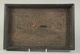 A FINE 19TH CENTURY ANGLO INDIAN CARVED EBONY RECTANGULAR TRAY, 33cm x 21cm.