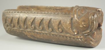 A RARE 17TH-18TH CENTURY INDO PERSIAN CARVED STONE WATER SPOUT, with lion head terminal, 33cm long.