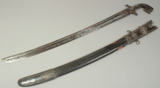 A RARE EARLY 19TH CENTURY ARAB YEMENI SILVER MOUNTED SWORD, with leather overlaid wooden scabbard,