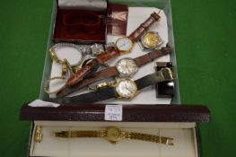 A collection of gent's and ladies wristwatches.