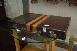 A backgammon case and contents.