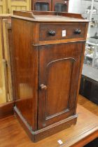 A Victorian mahogany pot cupboard.