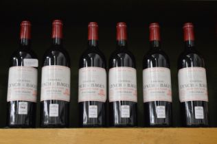Six bottles of Chateau Lynch Bages 1998.