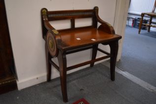 A 19th century walnut and brass mounted hall seat.