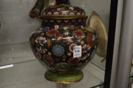 A large cloisonne jar and cover.