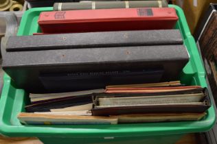 A quantity of stamp albums and contents.