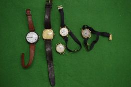 A collection of gold and other gentleman's and ladies wristwatches.