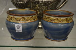 A pair of small Doulton jardinieres.