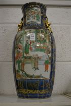 A large 19th century Chinese porcelain vase painted with figures (rim af).