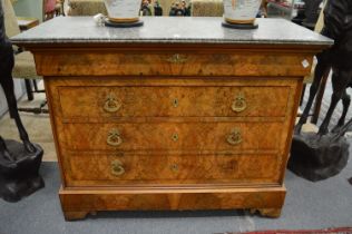 A good 19th century French walnut and grey marble top four drawer commode.