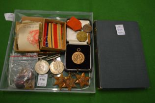 Five WW2 medals, unnamed together with sporting medals and other items to include a book 'They Die