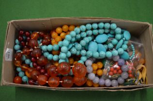 A quantity of bead necklaces etc.