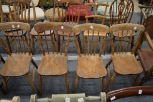 A set of four 19th century beech and elm kitchen chairs.