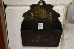A Japanese black lacquer chinoiserie decorated wall pocket.