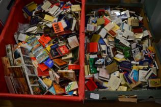 A large quantity of match boxes and match books.