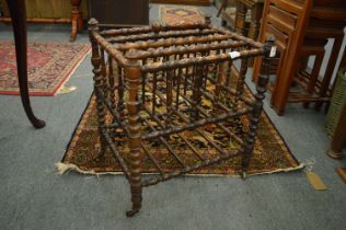 A Victorian rosewood bobbin turned magazine rack.