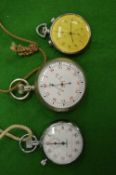 An unusual double sided stop watch (?) together with two other stop watches.