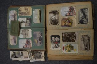 Good large collection of postcards, circa 1900 and later in two albums together with some loose.