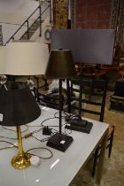 Three table lamps.