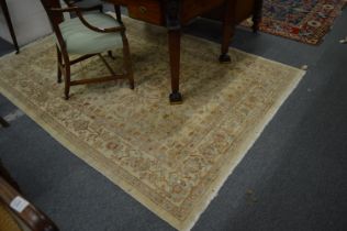 A Persian Qashqai carpet, beige ground with stylised floral decoration, 245cm x 172cm.