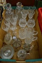 A box of glassware to include a pair of decanters.