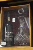 A boxed set containing Croft 1977 vintage port and a decanter.