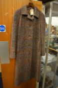 An Aquascutum wool coat.