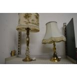 Two brass table lamps.