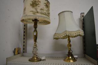 Two brass table lamps.