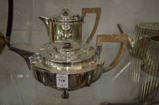 A stylish plated tea pot and matching hot water jug.