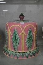 A majolica cheese dome and stand (faults).