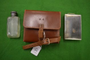 A leather cased sandwich box and matching jar.