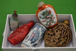 Five Chinese snuff bottles.