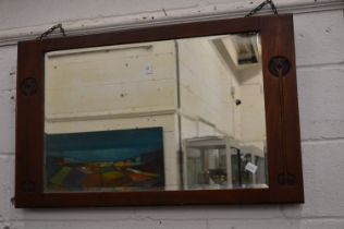 An Art Nouveau rectangular mirror.