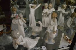 A group of Lladro and Neo figures.