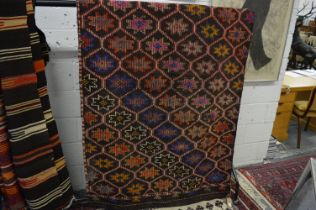 A Kilim carpet, 229cm x 124cm.