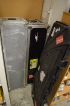 Two aluminium storage cases and a gun case.