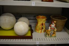 Three decorative spheres, decorative jug and other items.