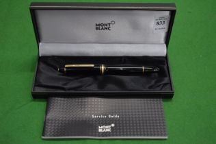 A Mont Blanc fountain pen with box and paperwork.