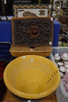 A large earthenware bowl, an old pine stool and other collectables.