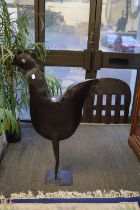 A large black painted metal cockerel, 115cm high.