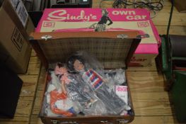 Sindys Own Car, boxed, together with a small suitcase containing dolls etc.